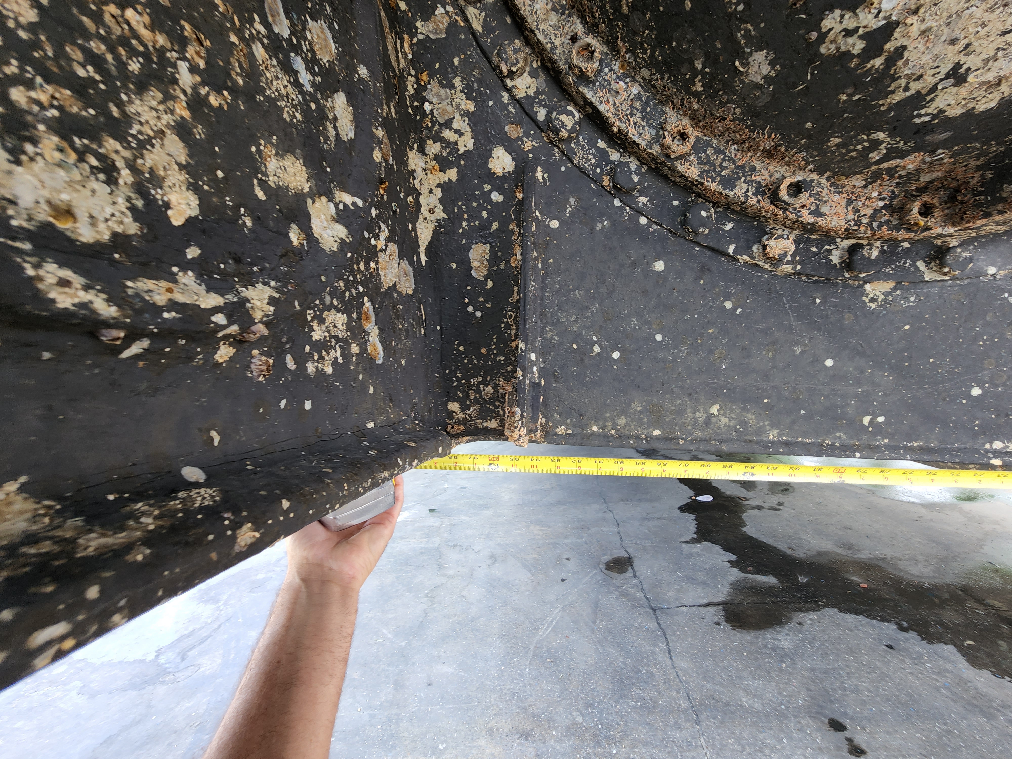 Corrosion and marine growth at Seakeeper SK2 hull mount point — Cobia 330 DC, 2022